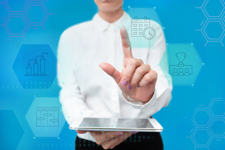 Lady In Uniform Standing Holding Tablet In Hand Pressing Virtual Globe Button. Bussiness Woman Carrying Tab Poining For New Futuristic Technologies.の写真素材