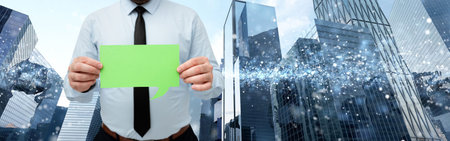 Businessman Holding Chat Box With Both Hands Around Futuristic Technology.