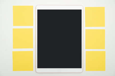 Office Supplies Over Desk With Keyboard And Glasses And Coffee Cup For Working Remotely, Assorted School Utilities For Studying With Hot Drink And Eyeglasses.の写真素材