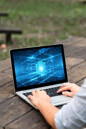 Laptop Placed Resting On Table Working In The Park Actively Accomplishing Remote Jobs. Minicomputer...