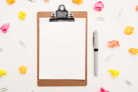 Multiple Assorted Collection Office Stationery Photo With Pens Pencils Notepads Notebook Ruler Stapler Scissors Clippers Paper Clips Holders Clipboard Placed Over Tableの写真素材