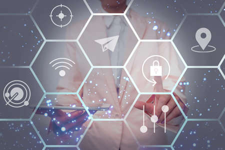 Lady In Uniform Side Standing Holding Tablet In Hand Virtually Toching On Screen. Bussiness Woman Carrying Tab Writing New Futuristic Technologies.の写真素材