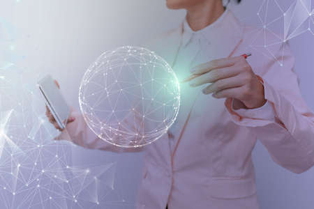 Woman In Suit Holding Tablet With Circular Holographic Technology Display. Lady In Uniform Displaying And Visualizing Mobile Network With Futuristic Hologram Tech.の写真素材
