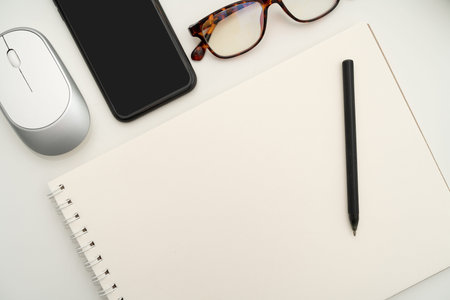 Office Supplies Over Desk With Keyboard And Glasses And Coffee Cup For Working Remotely, Assorted School Utilities For Studying With Hot Drink And Eyeglasses.の写真素材