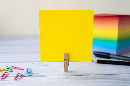 Blank Sticky Note Laundry Clip Stack Of Colorful Paper Pen Placed On Desk.の写真素材