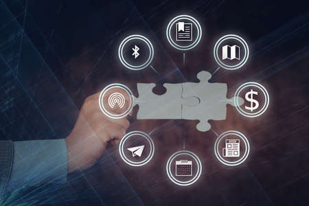 Hand Holding Jigsaw Puzzle Piece Unlocking New Futuristic Technologies. Palm Carrying Puzzles Part Displaying Solving Late Innovative Virtual Ideas.の写真素材