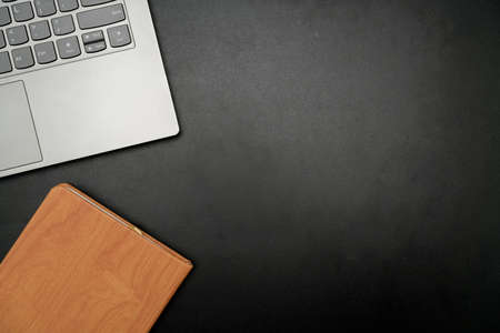Office Supplies Over Desk With Keyboard And Glasses And Coffee Cup For Working Remotely, Assorted School Utilities For Studying With Hot Drink And Eyeglasses.の写真素材