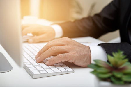Male businessman typing