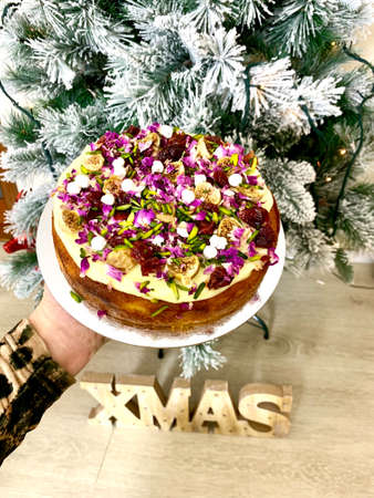Delicious orange cake with persian figs and pistachio at Christmasの写真素材