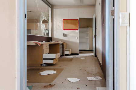 Vandalised office reception area of abandoned buildingの写真素材