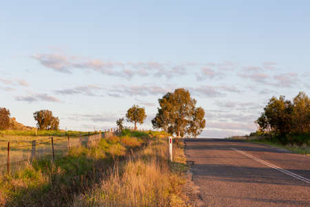 Sunny road in rural countrysideの写真素材