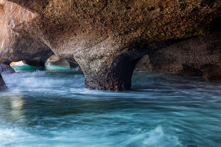 Inside sea caves exploringの写真素材