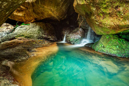 Wilderness waterfall oasisの写真素材
