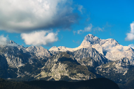 Triglav mountain peak in Slovenia national park on bright sunny dayの写真素材