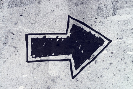 Arrow to the right on the road, direction symbol