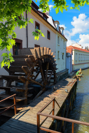 Prague wooden water mill near maple treeの写真素材