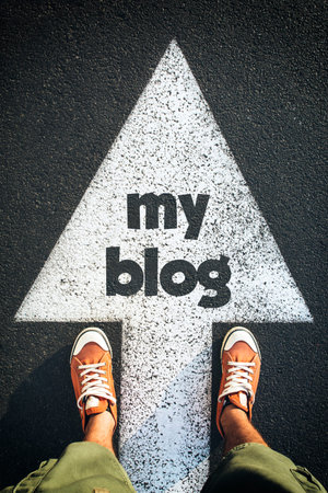 Red shoes standing on my blog sign