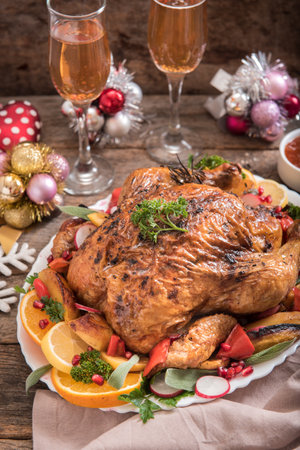 Winter holidays concept with split roasted turkey and wine,selective focusの写真素材