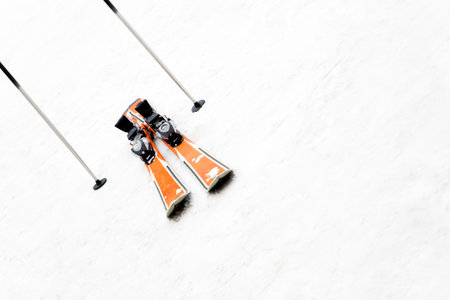 winter scene: a pair of skis left on the snow. Copy space
