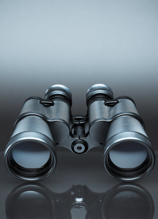 close up of binoculars on gray backgroundの写真素材
