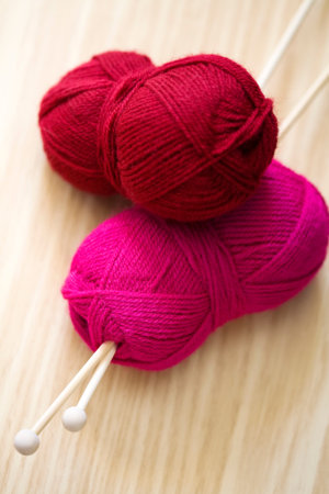 Still life of colored rolls of yarn