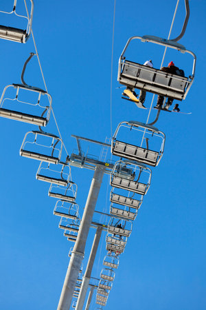 people on ski lift. Low angle viewの写真素材