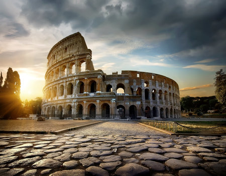 Bright sunset over Colosseum in Rome, Italyの写真素材