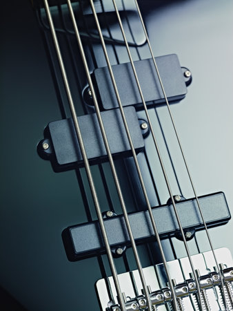 closeup of black five cords electric bass and pickups. Vertical shape, studio shotの写真素材