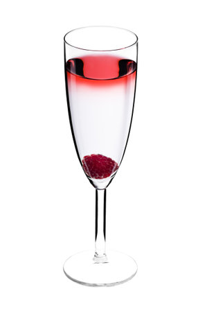 Designer cocktail isolated over white with raspberry in Champaign fluteの写真素材