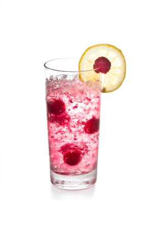 Raspberry cocktail with lemon garnish, over whiteの写真素材
