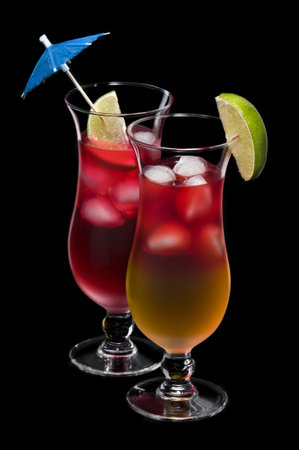Sea breeze and Bay Breeze cocktail over blackの写真素材