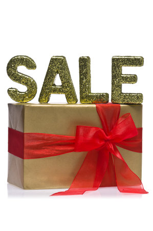 Present decorated with the word sale, over whiteの写真素材