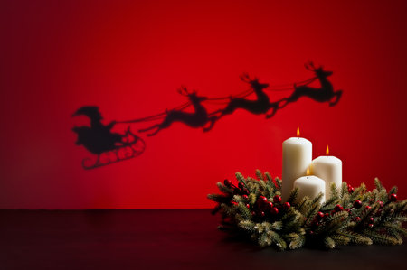Santas sledge on his way to deliver presents and candlesの写真素材