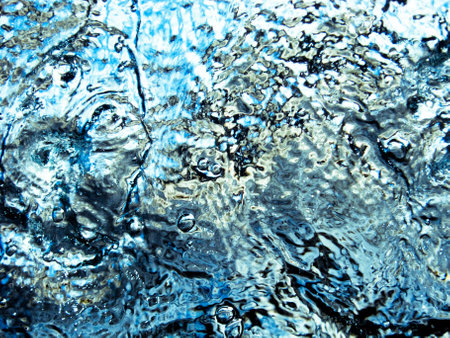 Water in a pool which lock like a frozen water stream of a river o a sunny dayの写真素材