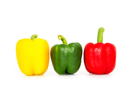 Bell pepper,3 colors capsicum or sweet pepper on white background .の写真素材