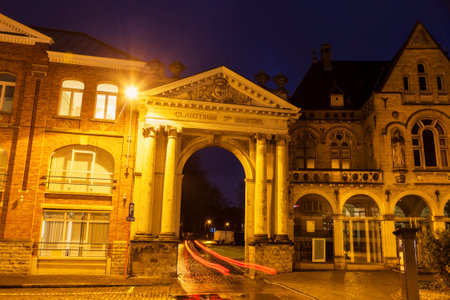 Arch in Ypres at night. Ypres, West Flanders, Flemish Region, Belgiumの写真素材