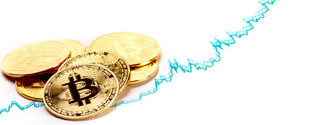 Gold coins with bitcoin sign and rate graph isolated on white background