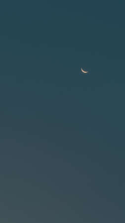 Vertical Panoramic View of a Night Sky with New Moon. Beauty of Nature. Halloween Background with Copy Space.の写真素材