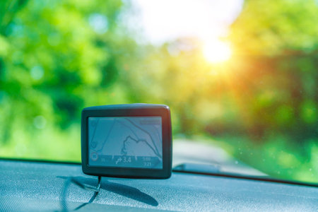 GPS navigator in the car, good help for travelers to find a necessary road, modern technology, electronic maps..の写真素材