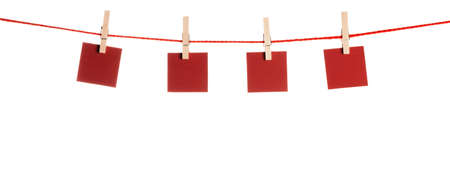 Set of blank notes held on string isolatedの写真素材