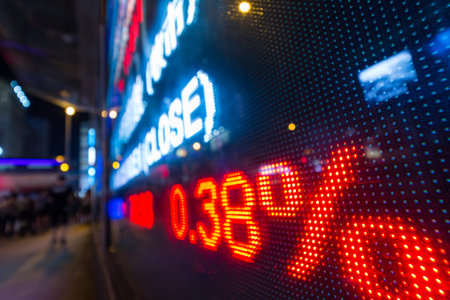 Stock market display in the street at night