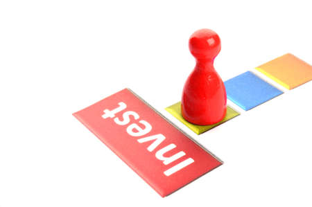 invest investment finance financial or business concept with pawn in whiteの写真素材