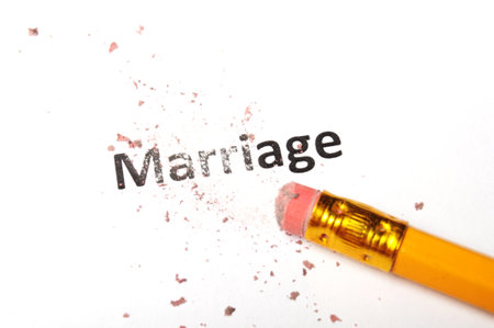 divorce concept with marriage word pencil and eraserの写真素材