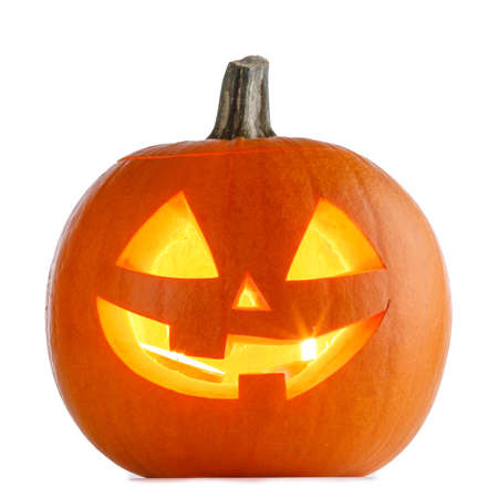 Glowing angry Halloween Pumpkin isolated on white backgroundの写真素材
