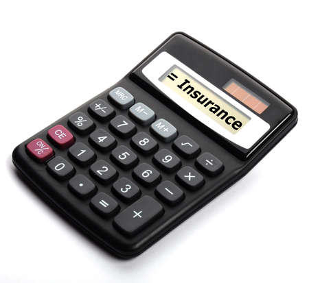insurance or risk concept with calculator showing financial securityの写真素材