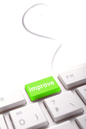 improvement or improve on key or button showing investment conceptの写真素材