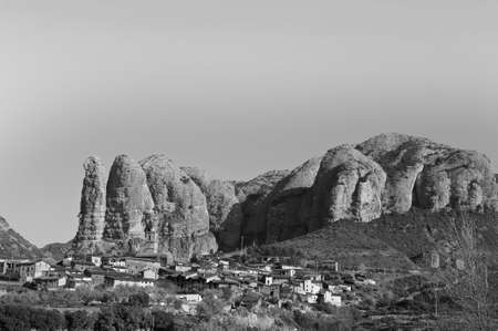 Deserted village in Spain in black and white. Medieval settlement at the foot of the cliffs in the Spanish Pyrenees.の写真素材