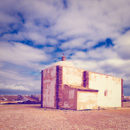 Catholic Church in the Portuguese Fortress Sagres on the Deserted Beach of the Atlantic Oceanの写真素材