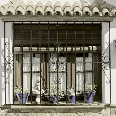 The Renovated Facade of the Old Spain House, Vintage Style Toned Pictureの写真素材