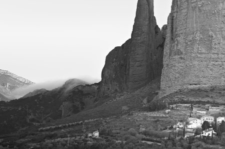 Deserted Spain in black and white. Spanish medieval village at the foot of the rocks in the Pereneus mountainsの写真素材
